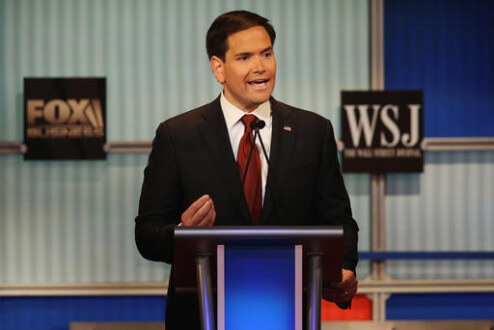 MILWAUKEE, WI - NOVEMBER 10: Presidential candidate Republican Sen. Marco Rubio (L) (R-FL) speaks during the Republican Presidential Debate sponsored by Fox Business and the Wall Street Journal at the Milwaukee Theatre November 10, 2015 in Milwaukee, Wisconsin. The fourth Republican debate is held in two parts, one main debate for the top eight candidates, and another for four other candidates lower in the current polls. (Photo by Scott Olson/Getty Images)