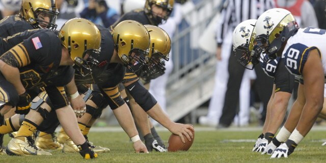 PHILADELPHIA - DECEMBER 8: The offensive line of the Army Black Knights gets set to snap the ball during a game against the Army Black Knights on December 8, 2012 at Lincoln Financial Field in Philadelphia, Pennsylvania. The Navy won 17-13. (Photo by Hunter Martin/Getty Images)