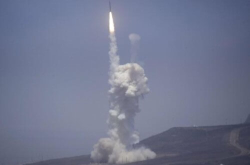 A GMD interceptor launching from its silo