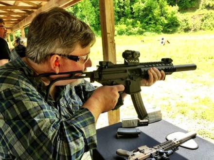 John Richardson of the "No Lawyers, Only Guns And Money" blog tries out a silenced Sig Sauer MPX.