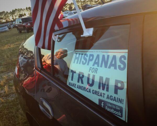 A Hispanics For Trump sign at a Trump rally